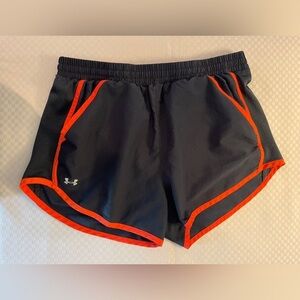 Under Armor black w/orange trip lined 3” inseam women’s running shorts. Size S.